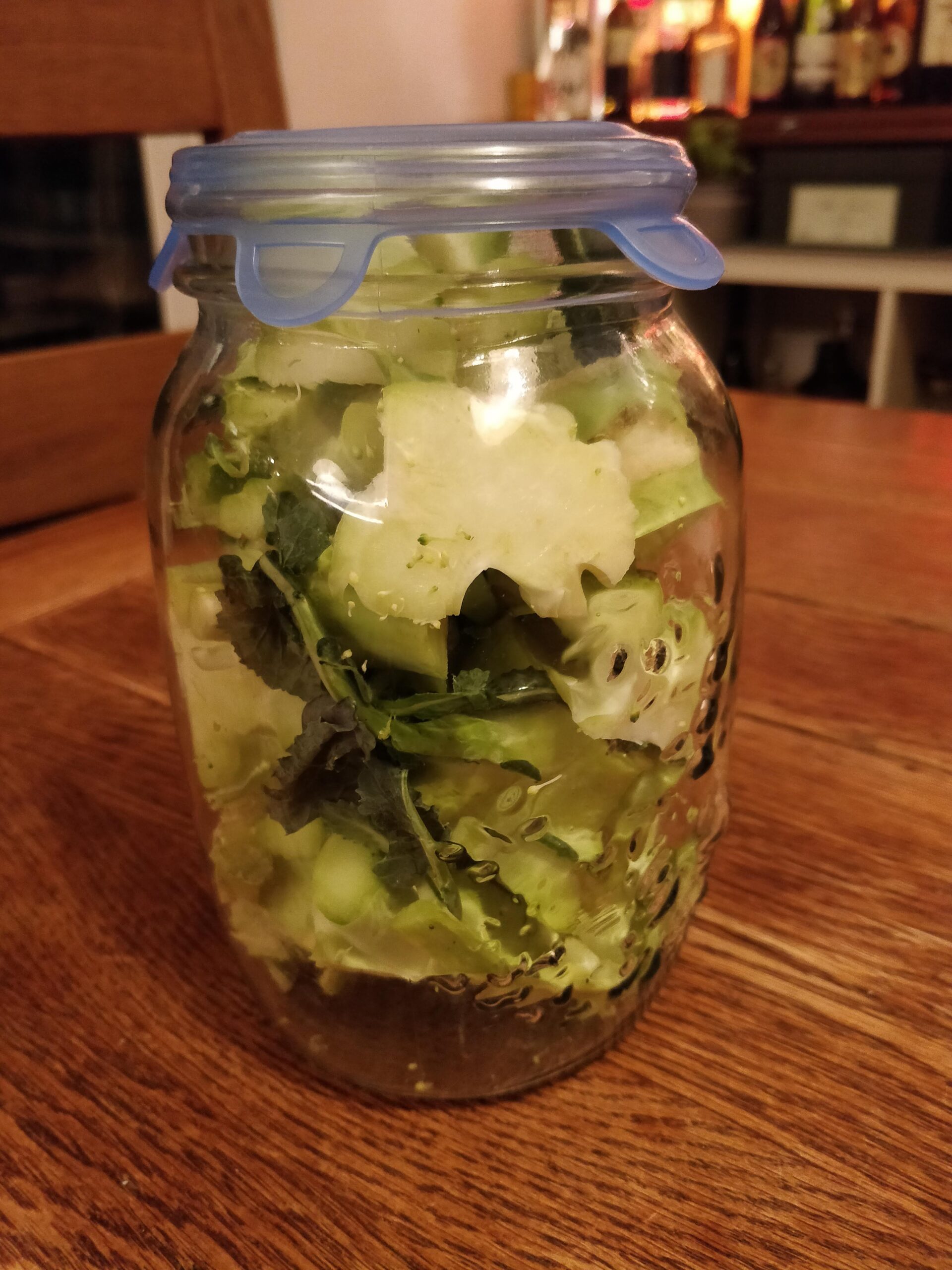 Broccoli stalks in a jar saved up for soup day - I lost the jar lid so I used a stretch lid